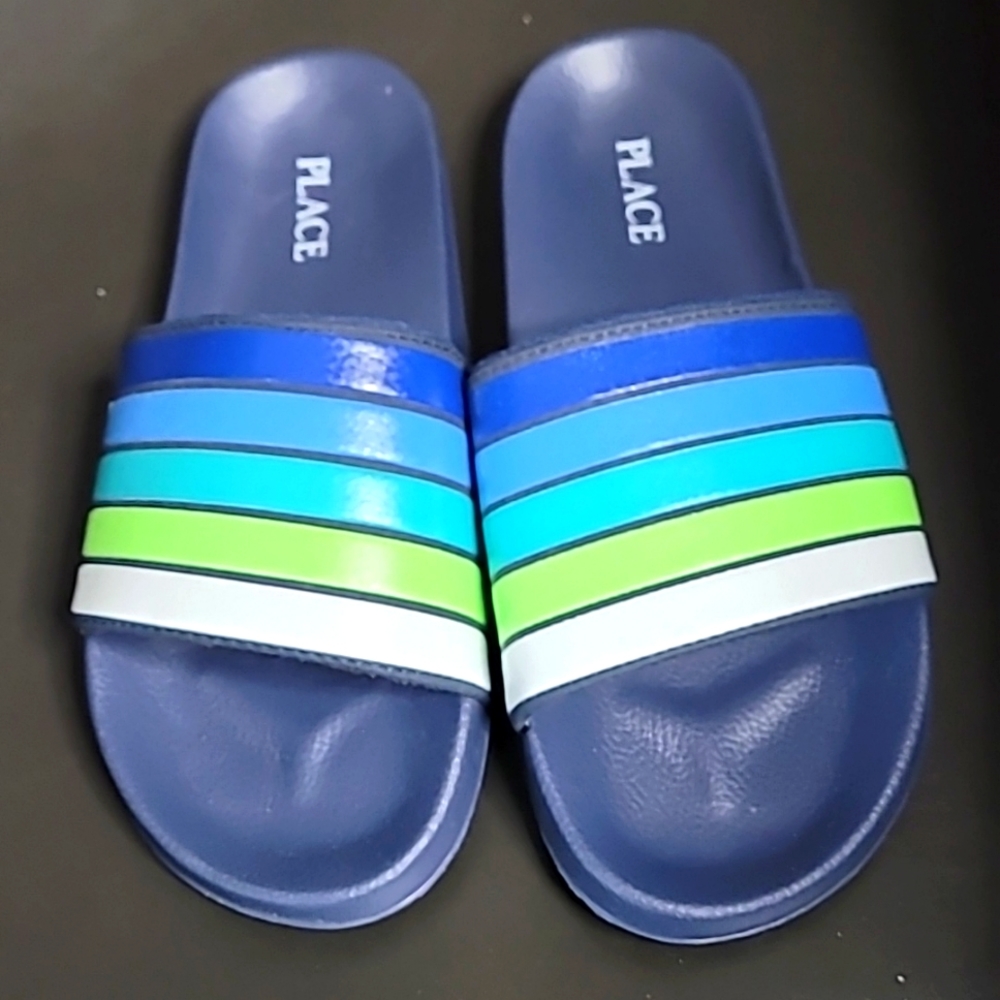 Little boy Children's Place flip-flops